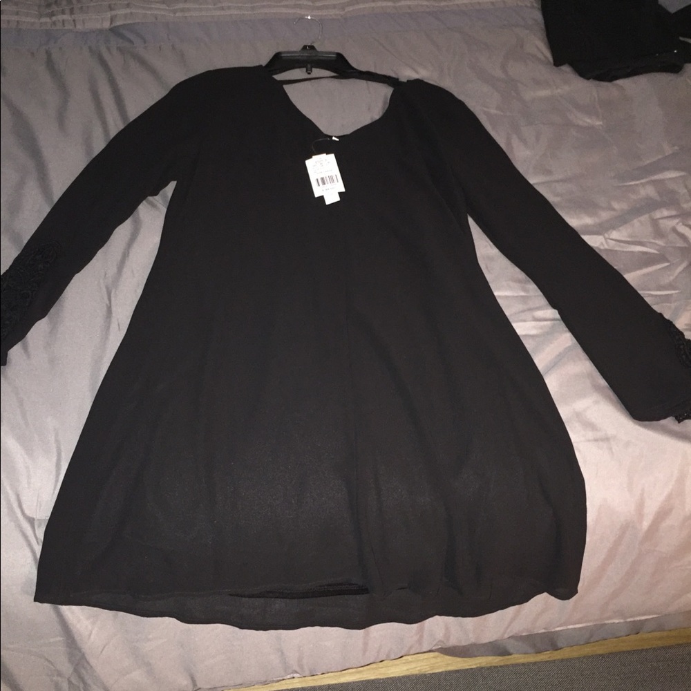 Black dress. Never worn! Tags still on